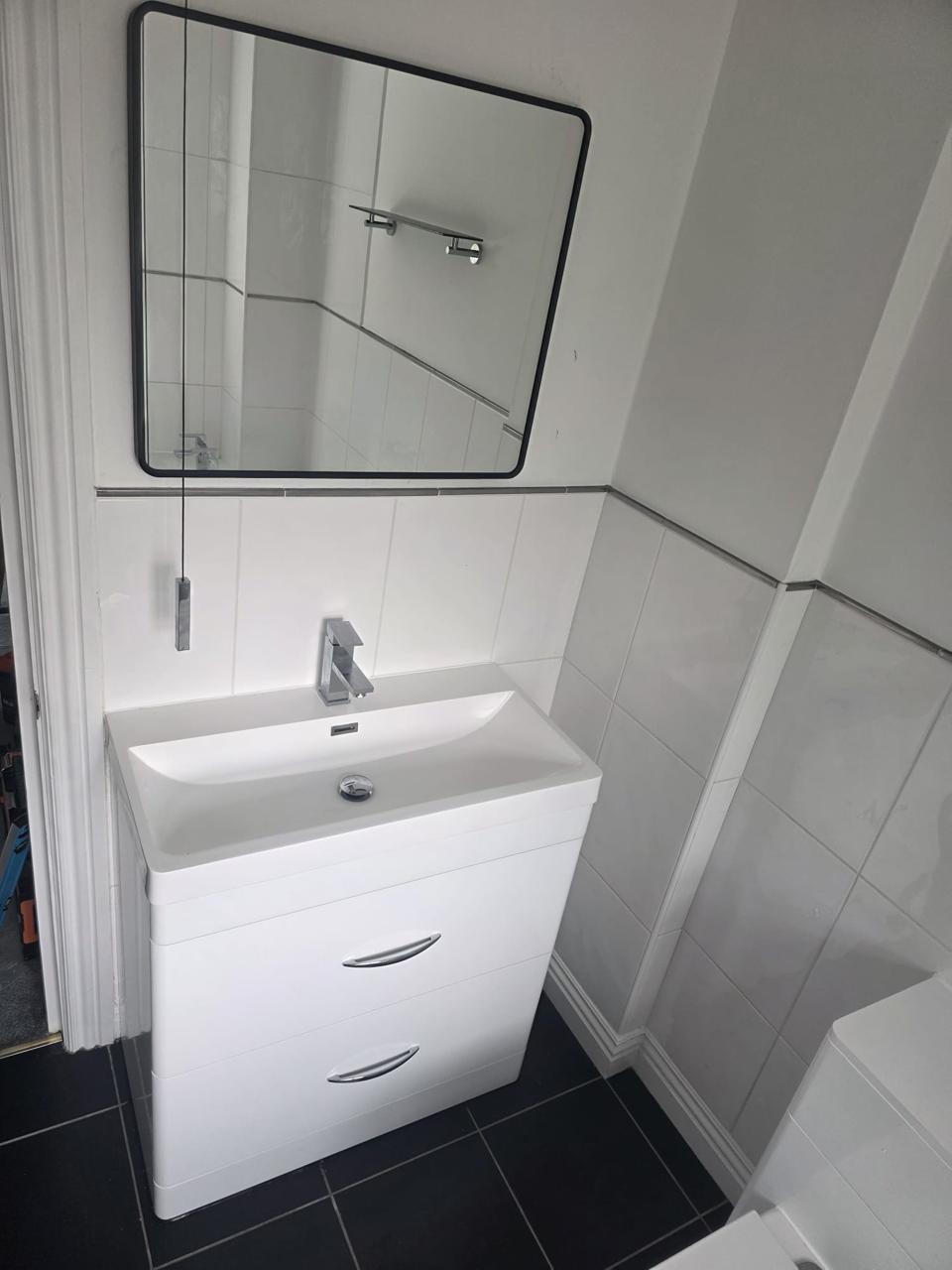 Bathroom basin and mirror installation in Chesterfield by Apex Flow