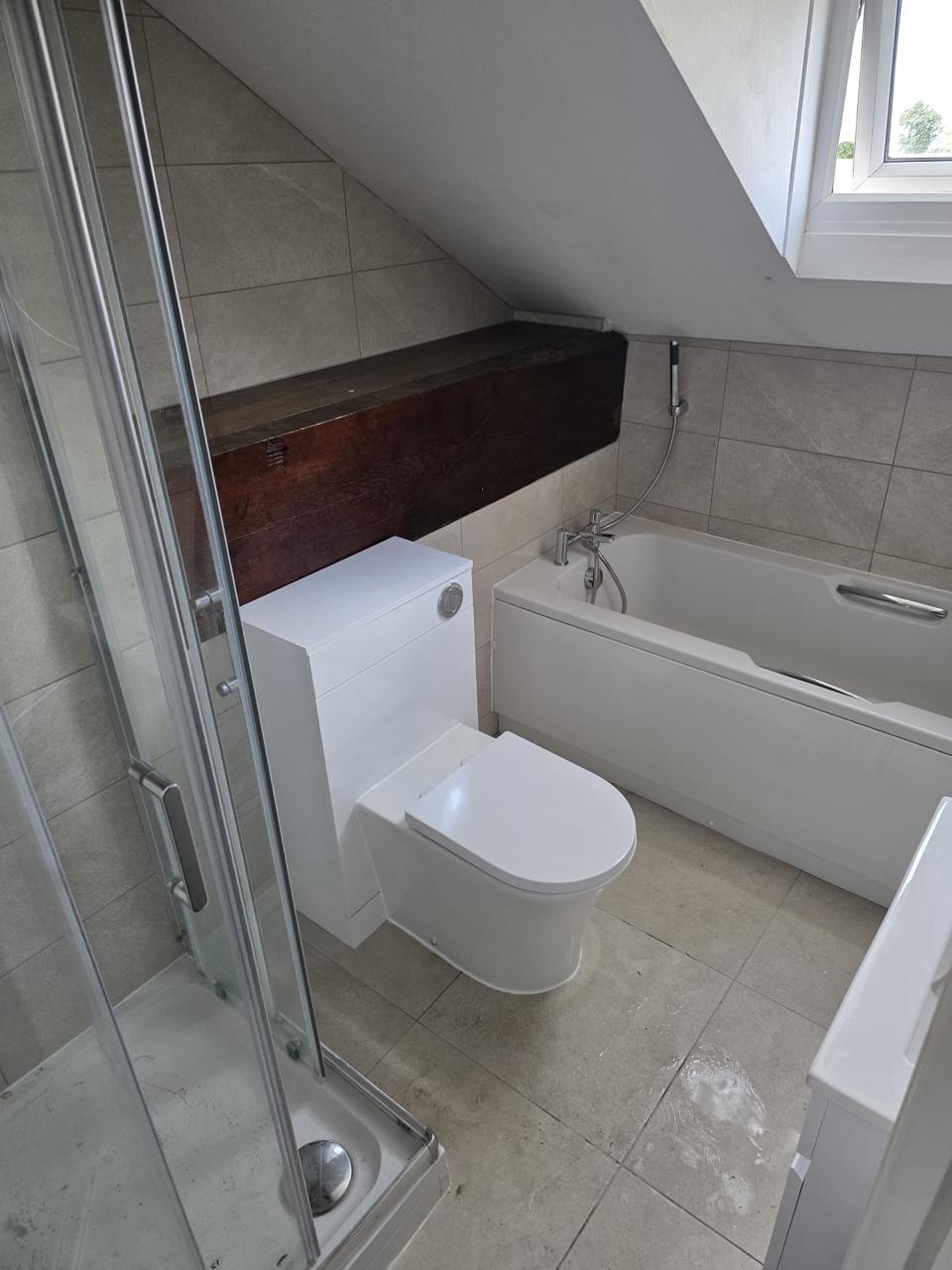 Bathroom renovation in Chesterfield with bath, shower and toilet by Apex Flow
