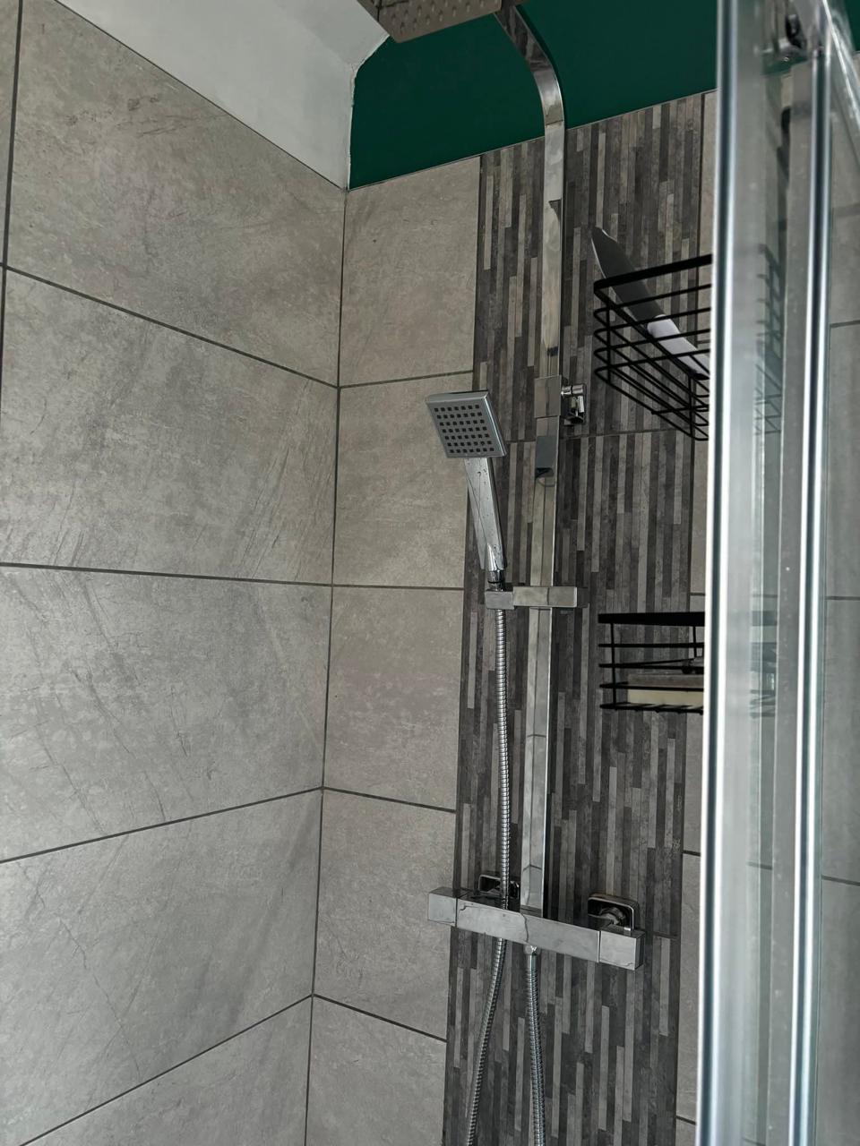 Shower tiling and fixture installation in Chesterfield by Apex Flow